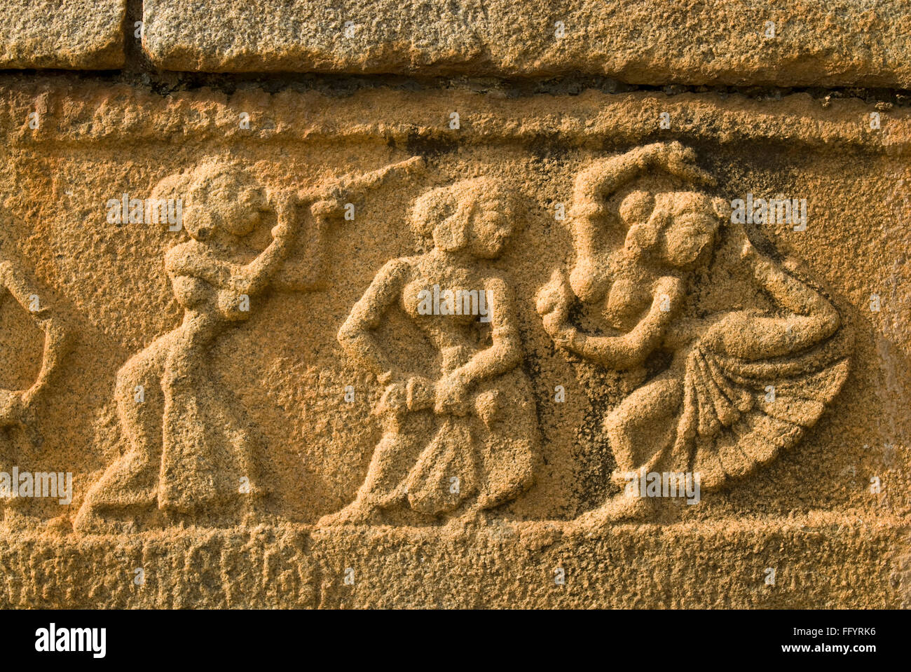 Dancers statue sequence Bas Relief in Mahanavami Dibba in Hampi , Karnataka , India Stock Photo
