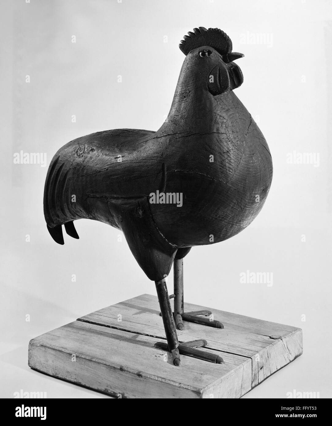 ROOSTER FIGURE, c1800. /nA carved and painted wooden rooster from Ohio, c1800. Stock Photo