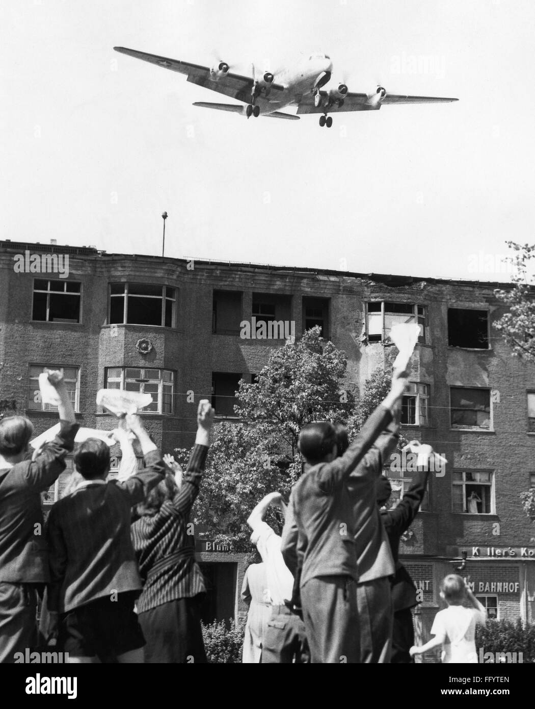 BERLIN: AIRLIFT, 1949. /nBerliners wave to an American airlift plane approaching Tempelhof Airfield for a landing, 5 May 1949, after the announcement of the lifting of the Berlin blockade. Stock Photo