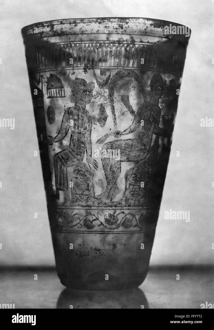 ROMAN GLASS VASE. /nRoman glass vase engraved with human figures, 3rd century. Stock Photo