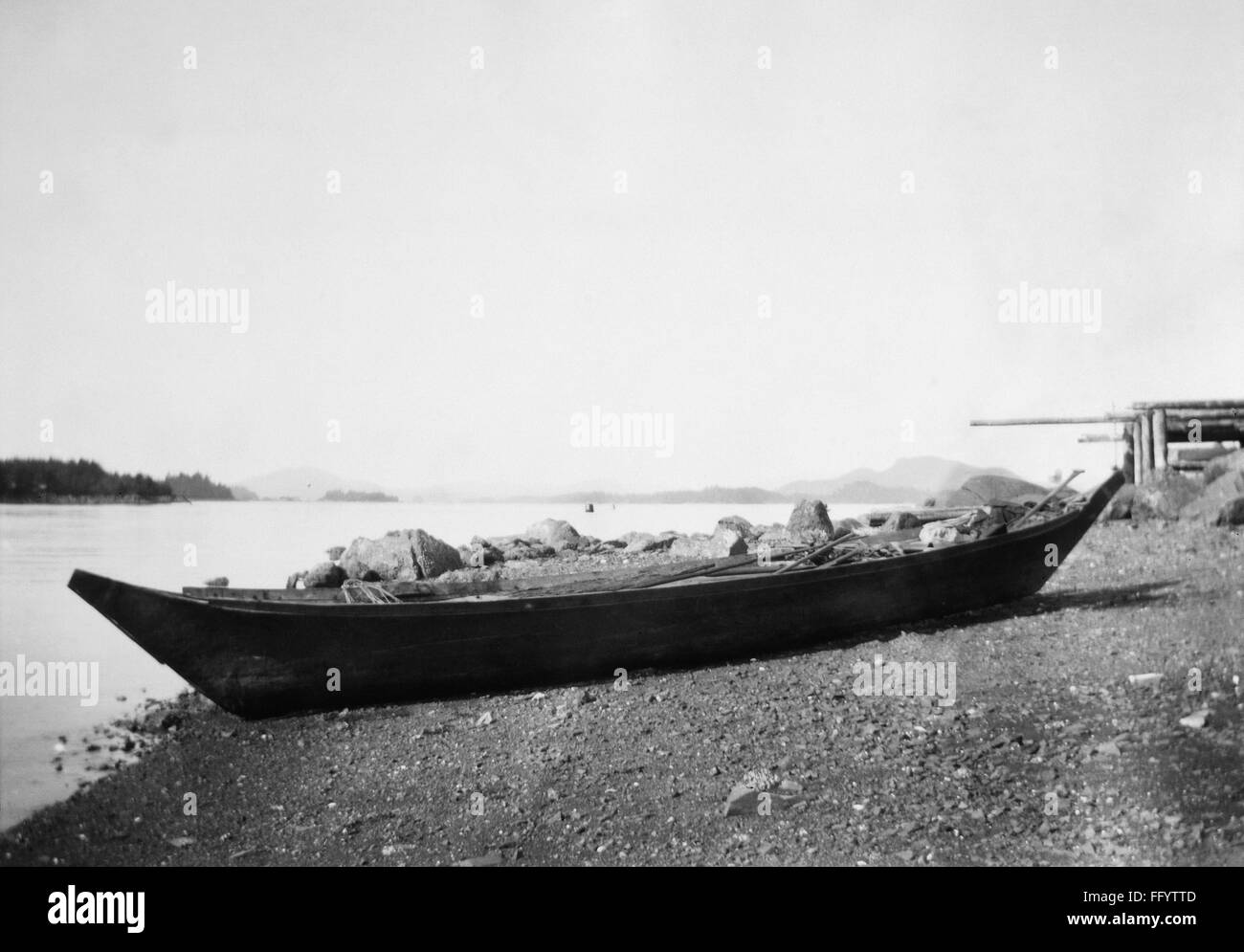 ALASKA: DUGOUT CANOE, 1905. /nA Tlingit dugout canoe on the shore at Sitka, Alaska. Photographed in 1905. Stock Photo