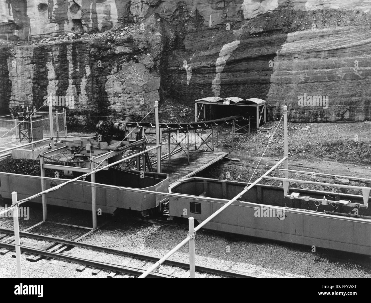 PENNSYLVANIA MINING, c1960. /nLoading coal into cars on a conveyor