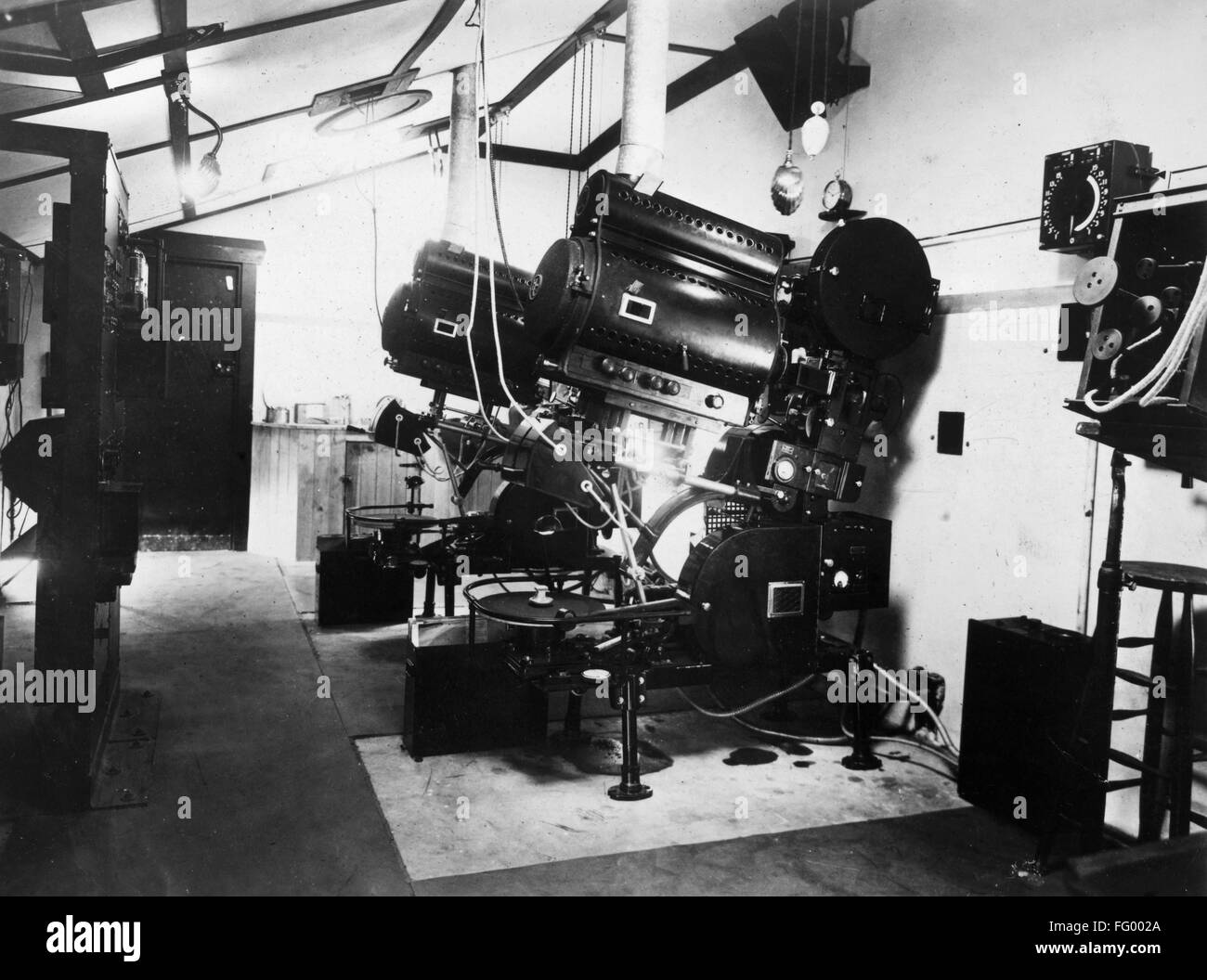FILMMAKING: SOUND, 1926. /nInterior of the projection booth and the projectors with disc attachments for sound at the Theatre Royal in Newcastle, England. Photograph, c1926. Stock Photo