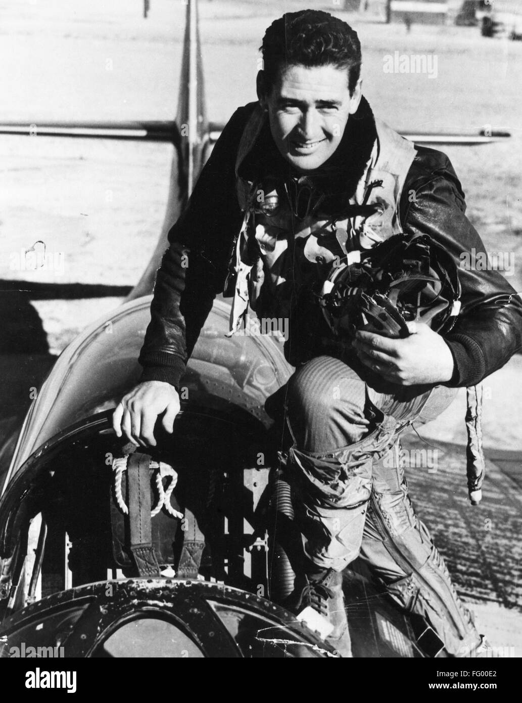 TED WILLIAMS (1918-2002). /nAmerican baseball player. Photographed in the cockpit of a Grumman F9F-6 Panther fighter plane, while a pilot for the U.S. Marine Corps during World War II, c1943. Stock Photo