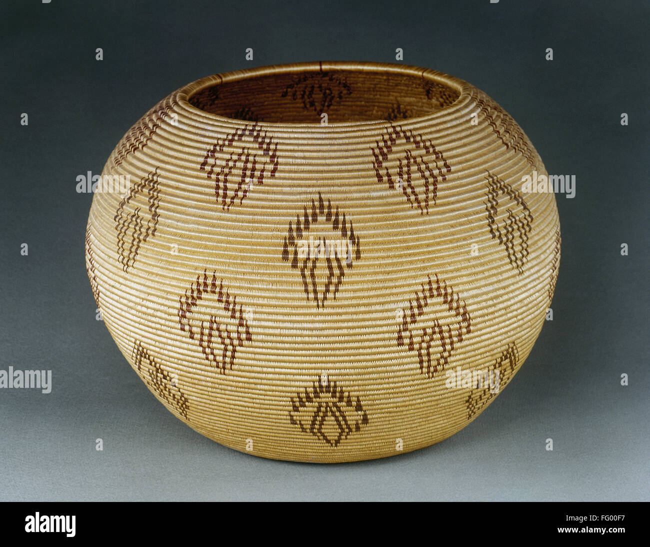 NATIVE AMERICAN BASKET. /nCoiled spherical basket or 'degikup,' made by