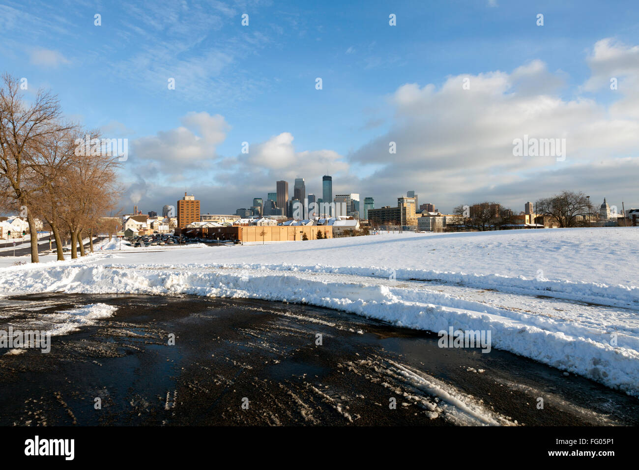 Minneapolis skyline with snow in the foreground. Urban landscape in the