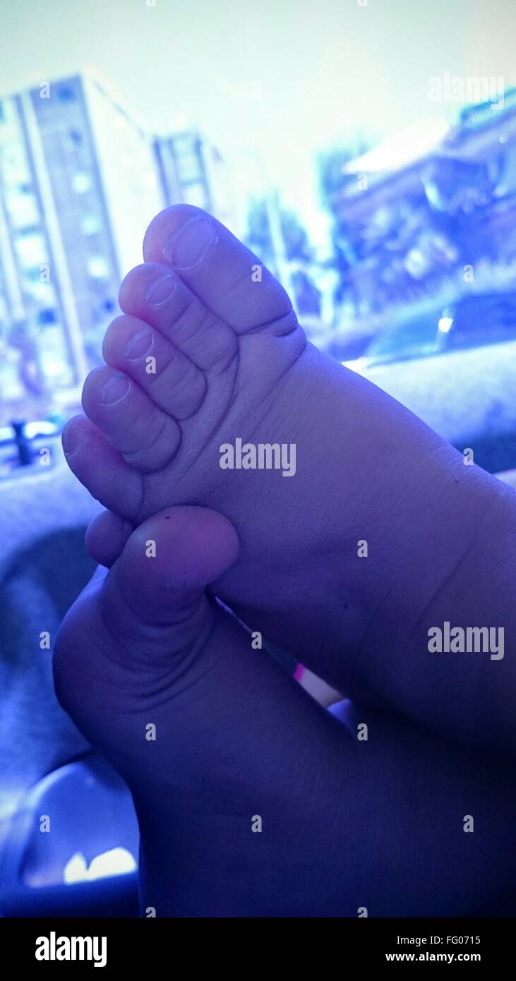 Close Up Crossed Legs Feet High Resolution Stock Photography and Images