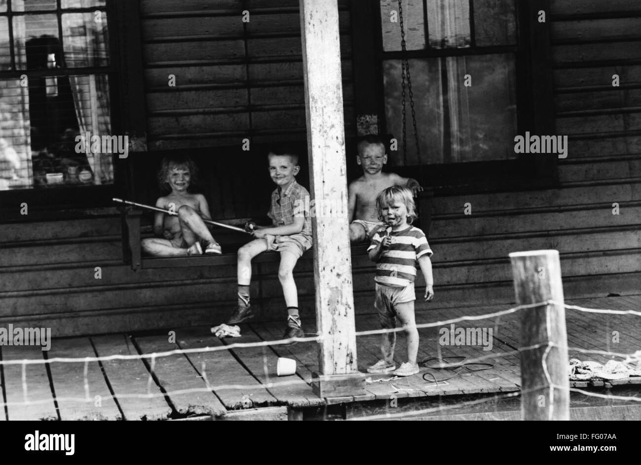 POVERTY APPALACHIA. /nA group of boys on the porch of a home in rural Appalachia. Photograph