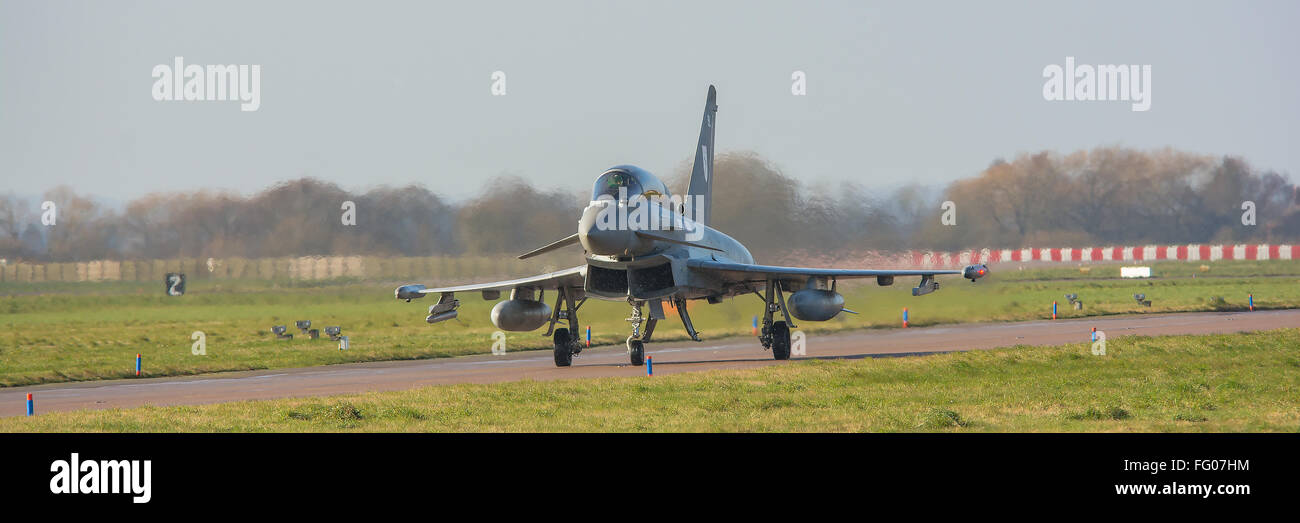 FILE PIC: RAF Coningsby, Lincolnshire, UK. 15th February, 2016. Typhoon Fighters leaving RAF Coningsby in Lincolnshire. Credit:  Paul Williams/Alamy Live News Stock Photo
