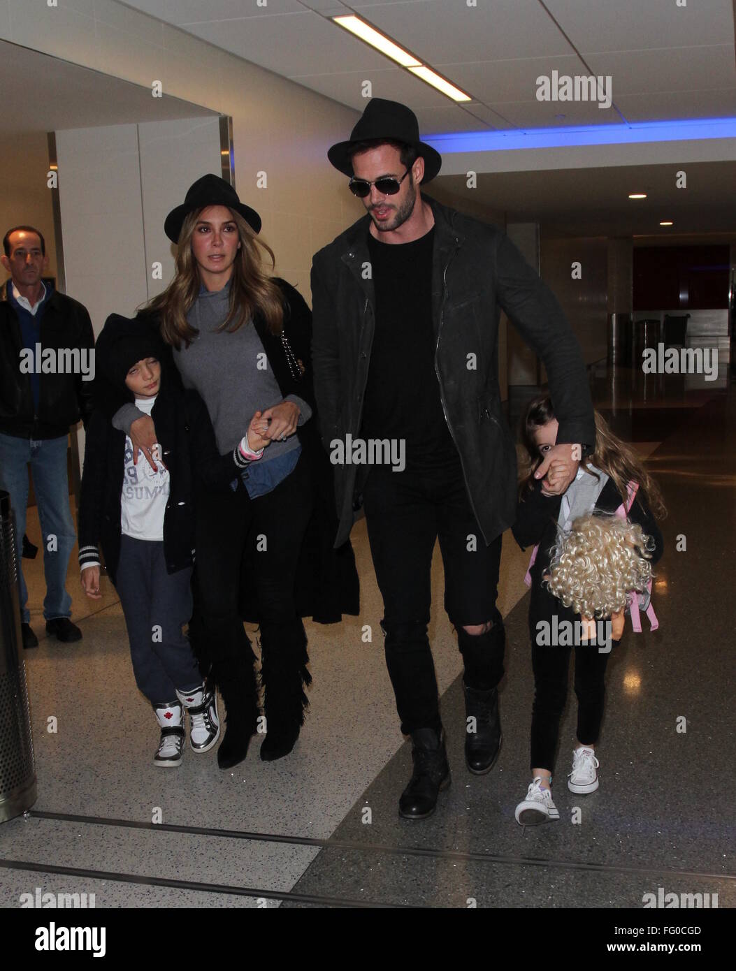 William Levy arrives at Los Angeles International Airport (LAX) with  Elizabeth Gutierrez and their children, Christopher and Kailey Featuring: William  Levy, Elizabeth Gutiérrez, Christopher Alexander Levy, Kailey Alexandra Levy  Where: Los Angeles,
