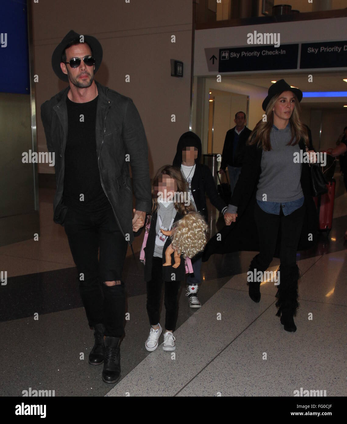 William Levy arrives at Los Angeles International Airport (LAX) with Elizabeth  Gutierrez and their children, Christopher and Kailey Featuring: William Levy,  Elizabeth Gutiérrez, Christopher Alexander Levy, Kailey Alexandra Levy  Where: Los Angeles,