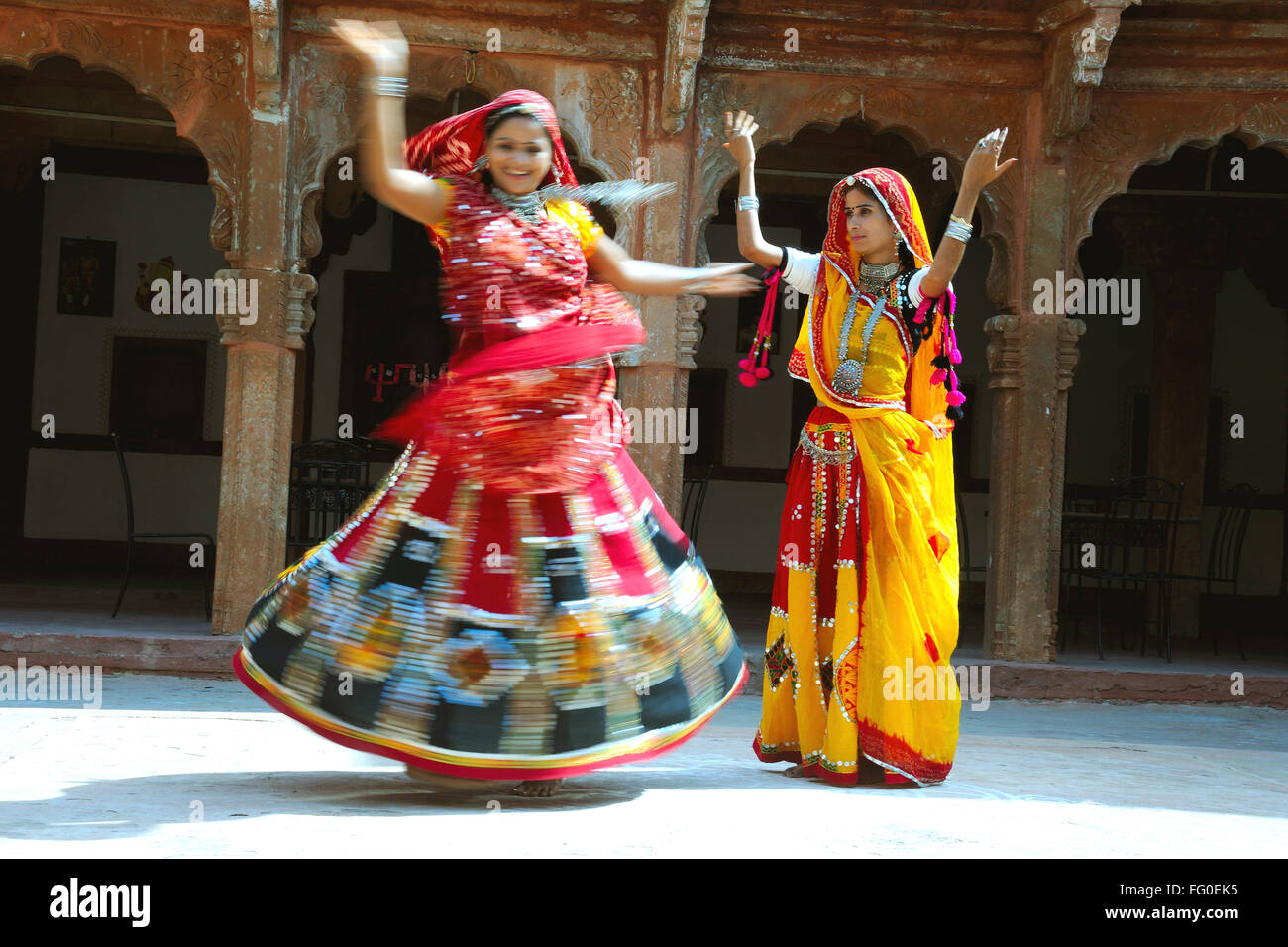 Rajasthani women performing ghoomer dance in haveli ; Rajasthan ; India MR#769D;769C Stock Photo