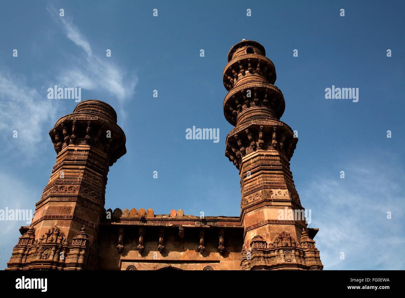 Five hundred seventy one year old shaking minarets of Bibiji mosque in Ahmedabad ; Gujarat ; India heritage Stock Photo