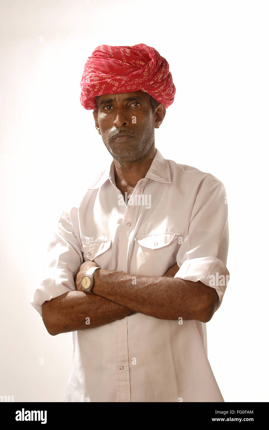 Indian man from Rajasthan wearing red pagdi MR #  693 D Stock Photo