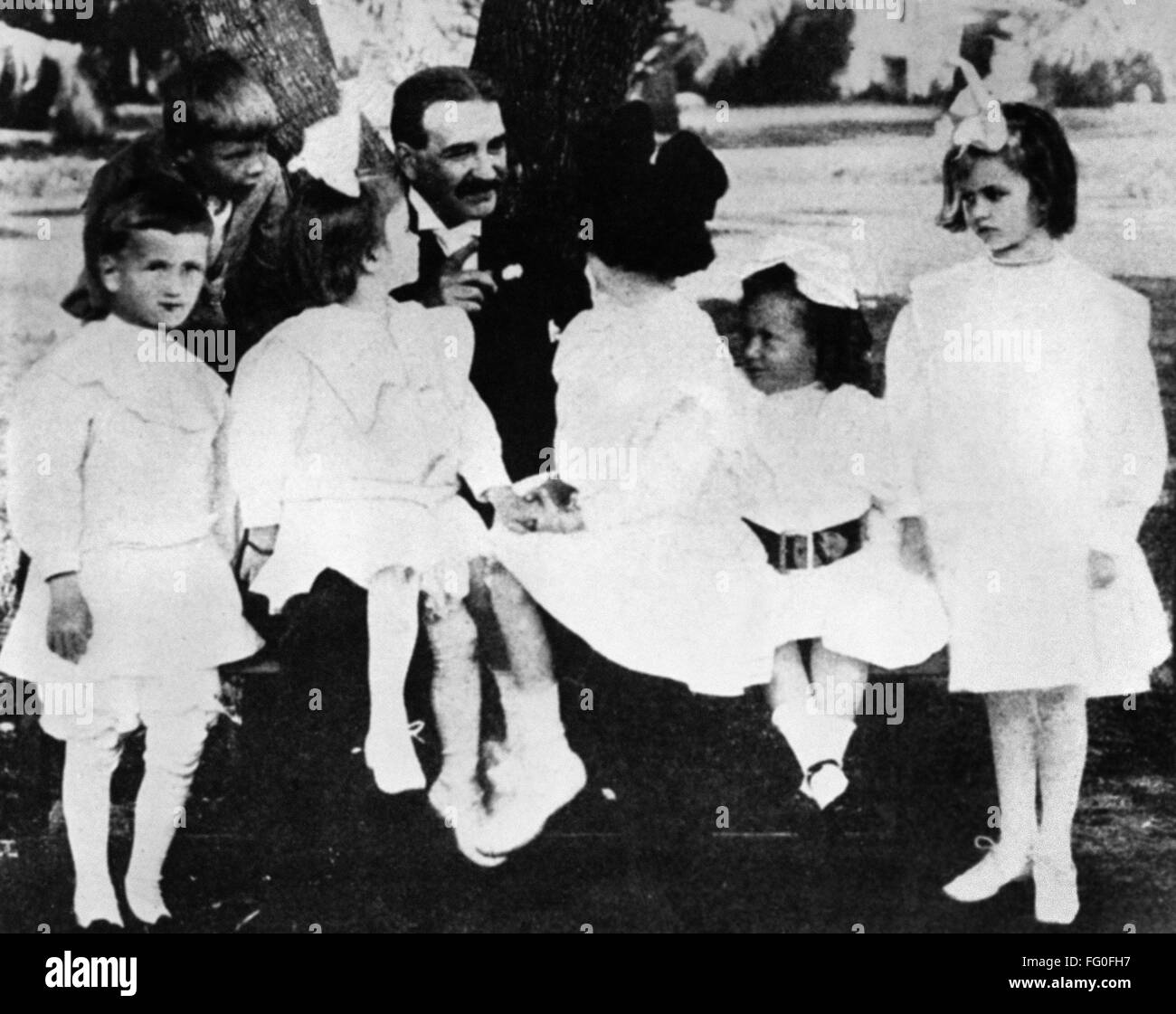 L. FRANK BAUM (1856-1919). /nAmerican author. Photographed with a group of children, c1914. Stock Photo