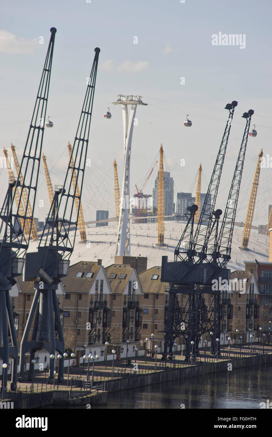 Excel marina in east London, UK, with O2 Arena Millennium Dome and Emirate Air Line cable car in background Stock Photo