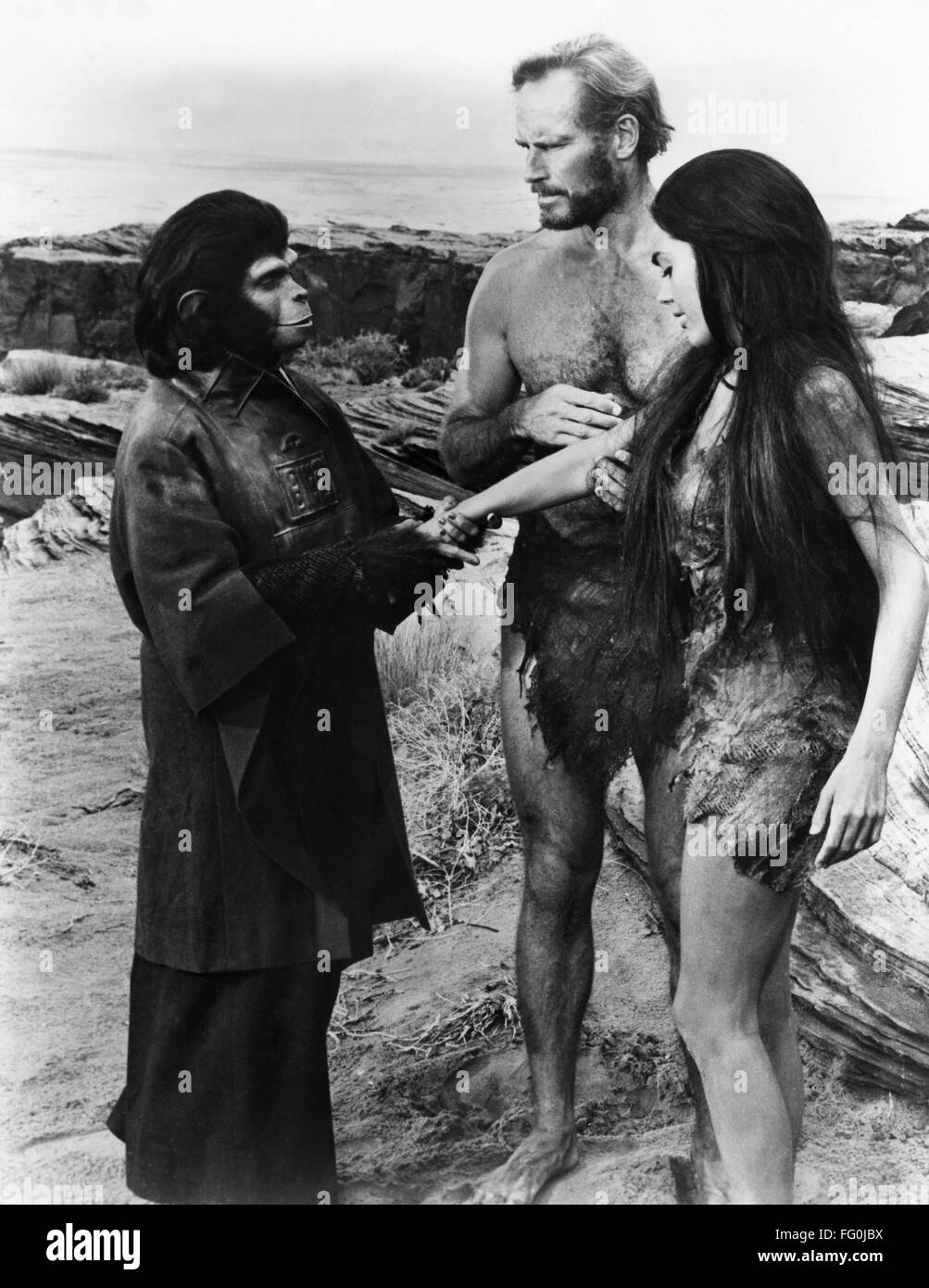 PLANET OF THE APES, 1968. /nCharleton Heston and Linda Harrison in a scene from the film, 'Planet of the Apes,' directed by Franklin J. Schaffner, 1968. Stock Photo