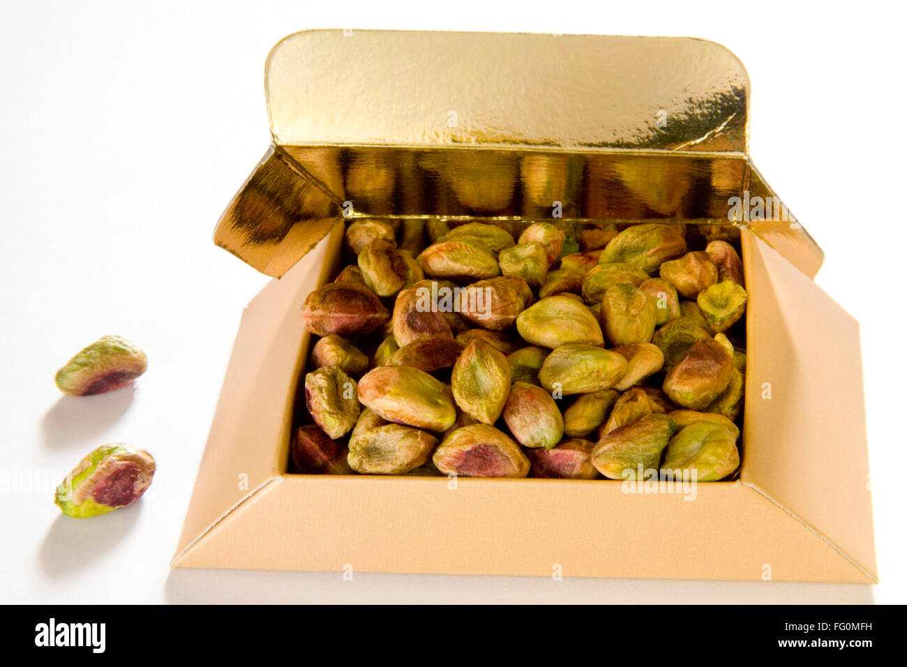 Dry fruit , whole Pistachio nuts Pista Pistacia vera in gift box Stock  Photo - Alamy