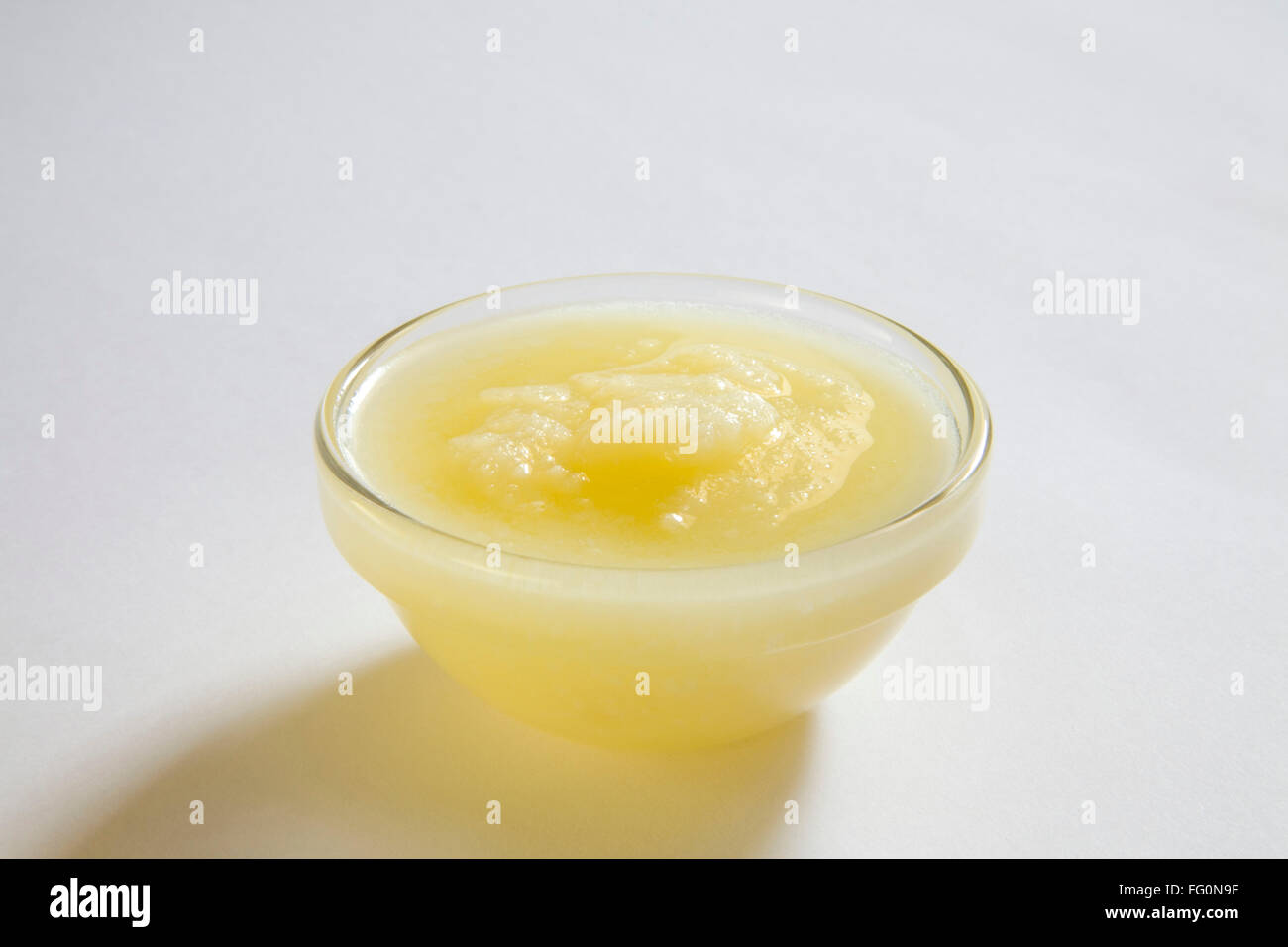 Homemade ghee or dairy product in bowl Stock Photo