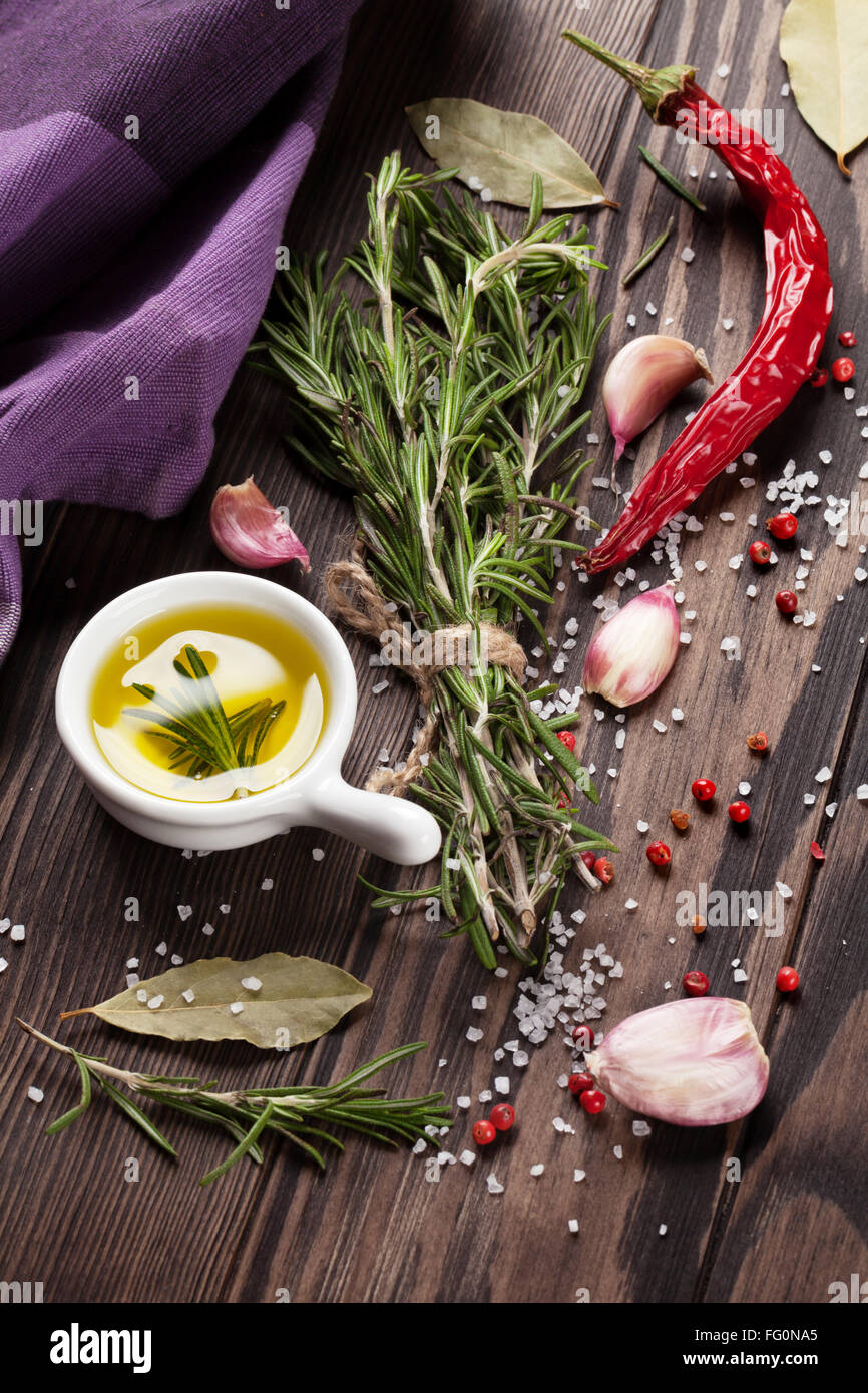 Herbs and spices over wood background Stock Photo