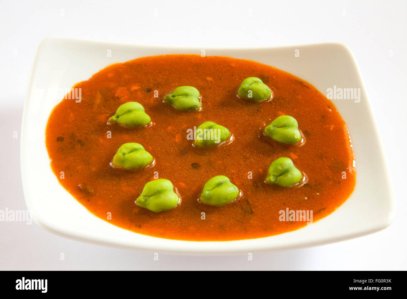 Cuisine , fresh green chickpeas with red curry hara chana cicer