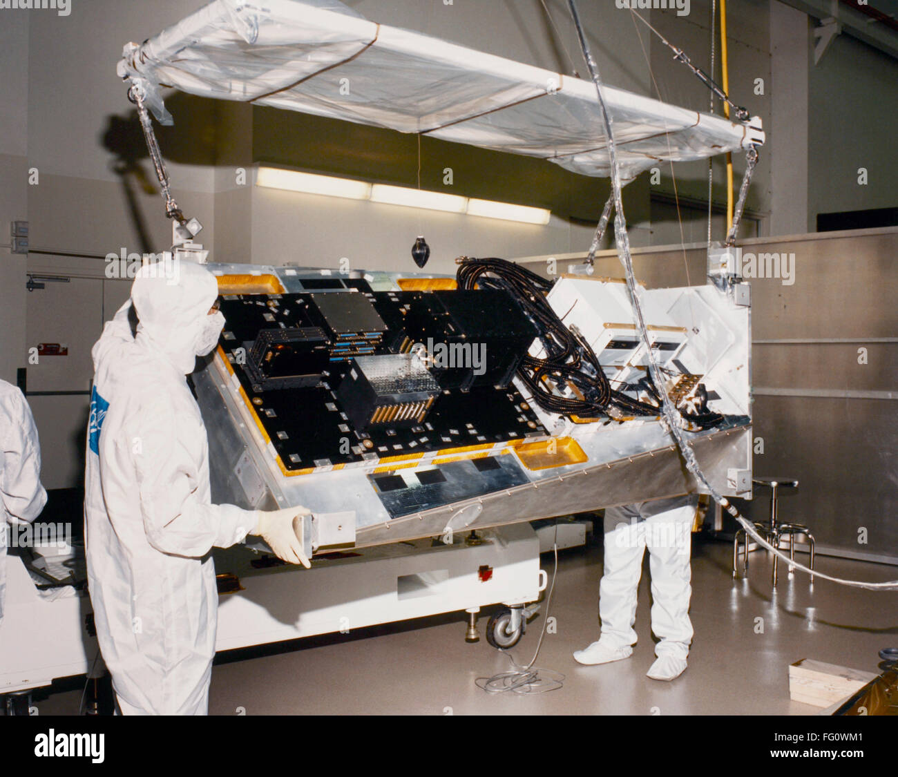 HUBBLE TELESCOPE COSTAR. /nTechnicians from Ball Aerospace and Communications in Boulder