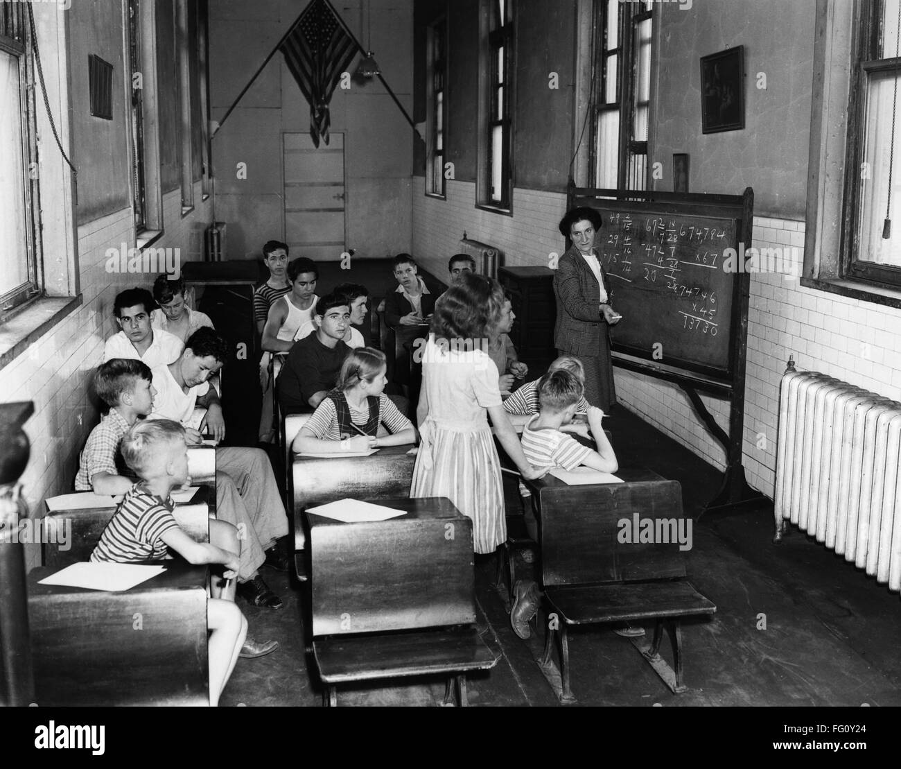 ELLIS ISLAND, 1947. /nChildren attending a class taught by social ...