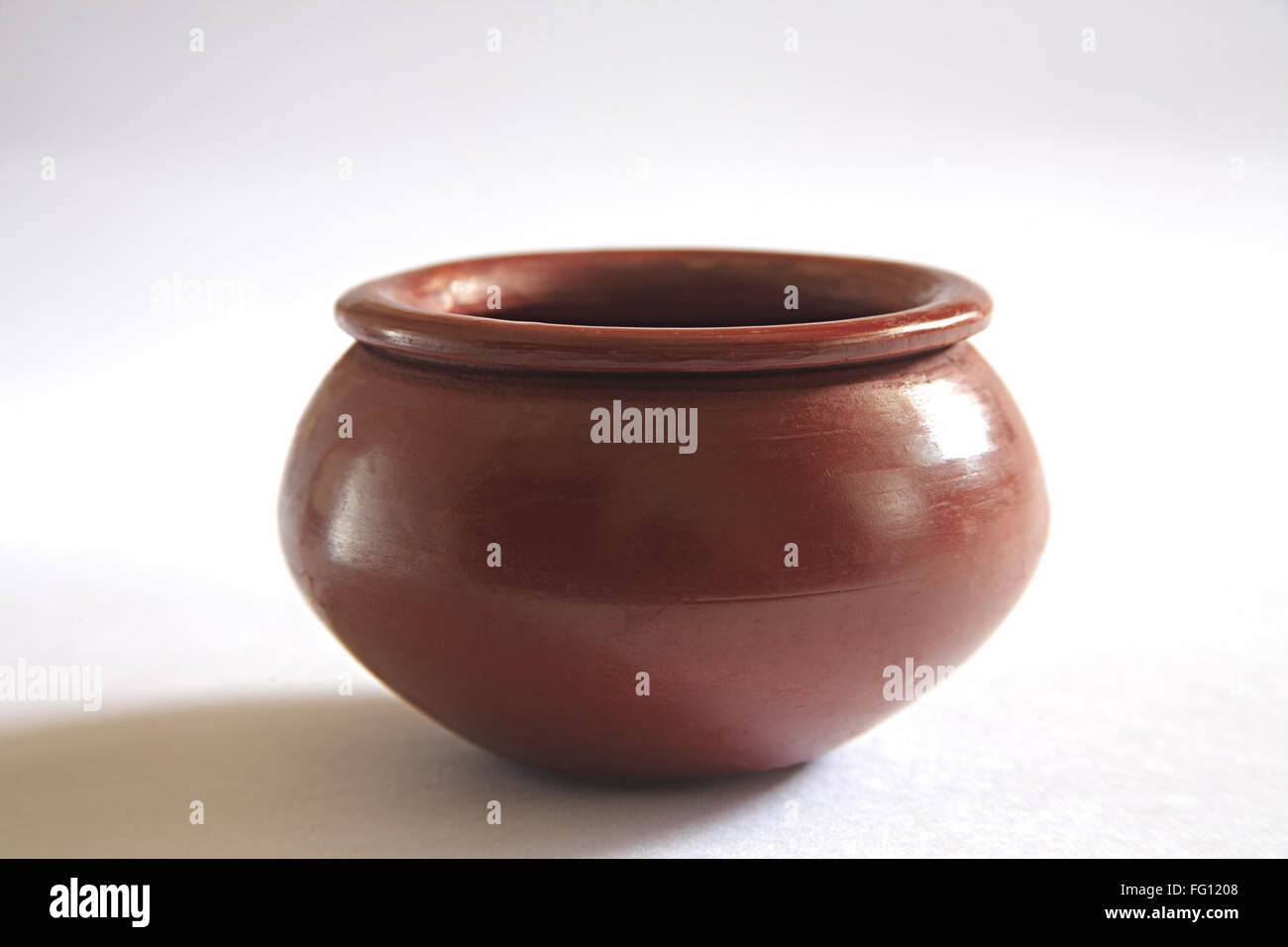 Concept , kamori clay or earthen pot crock pail pitcher small wide