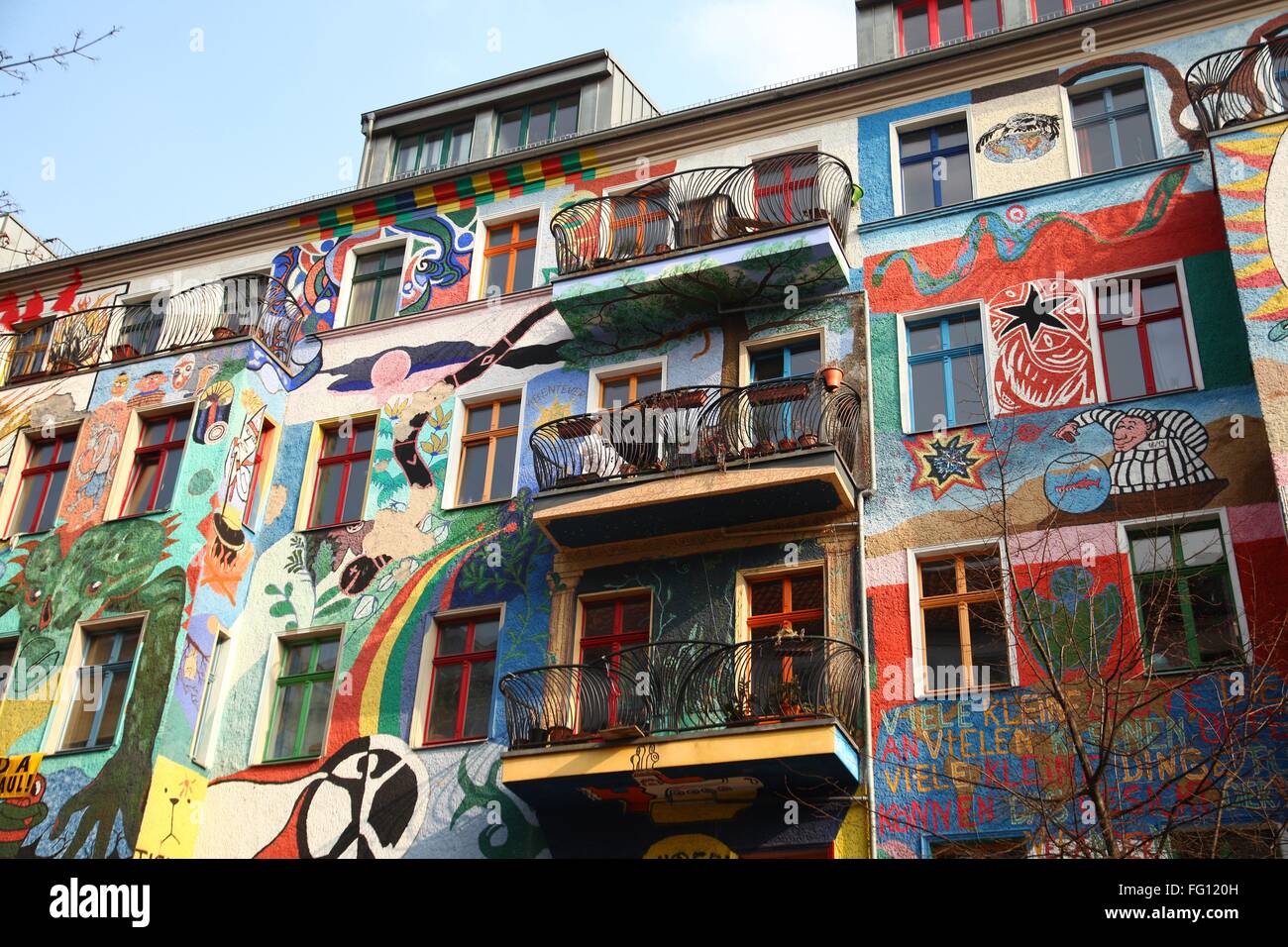 A former squat wit a painted facade in Berlin Friedrichshain is pictured on March, 16, 2015. Photo: Wolfram Steinberg/dpa Stock Photo