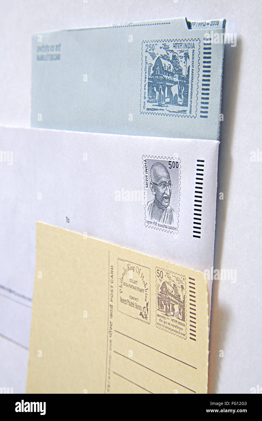 Concept , inland letter card stamped envelope and postcard on white