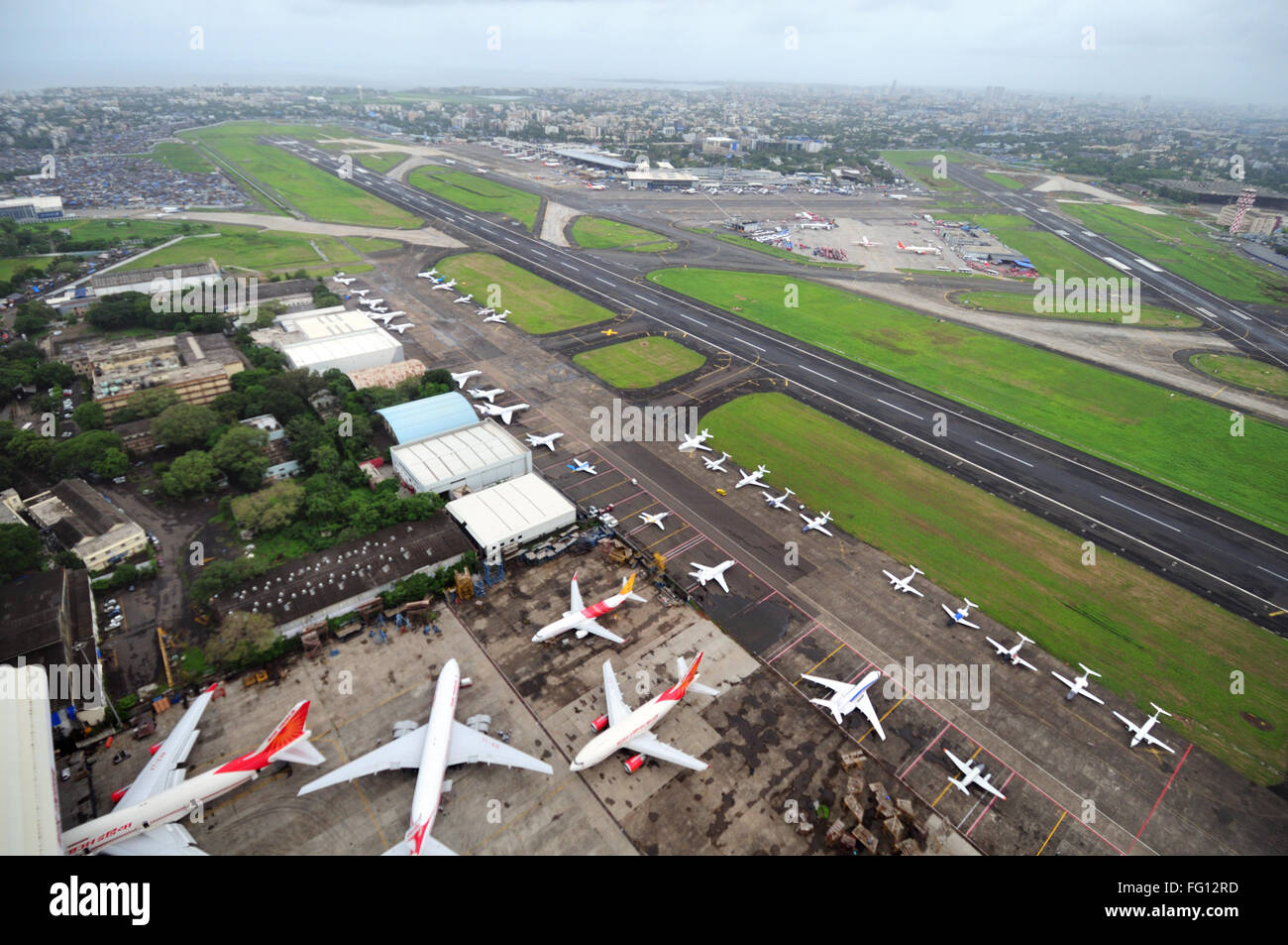 aerial view of runway with hangar of air india at chhatrapati shivaji international airport ; Sahar Bombay Mumbai Maharashtra Stock Photo