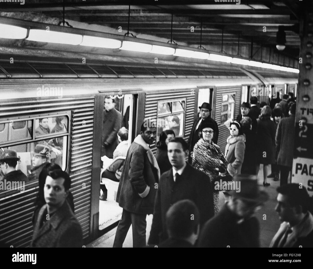 BROOKLYN, 1971. /nPassengers on the train and on the platform of the ...