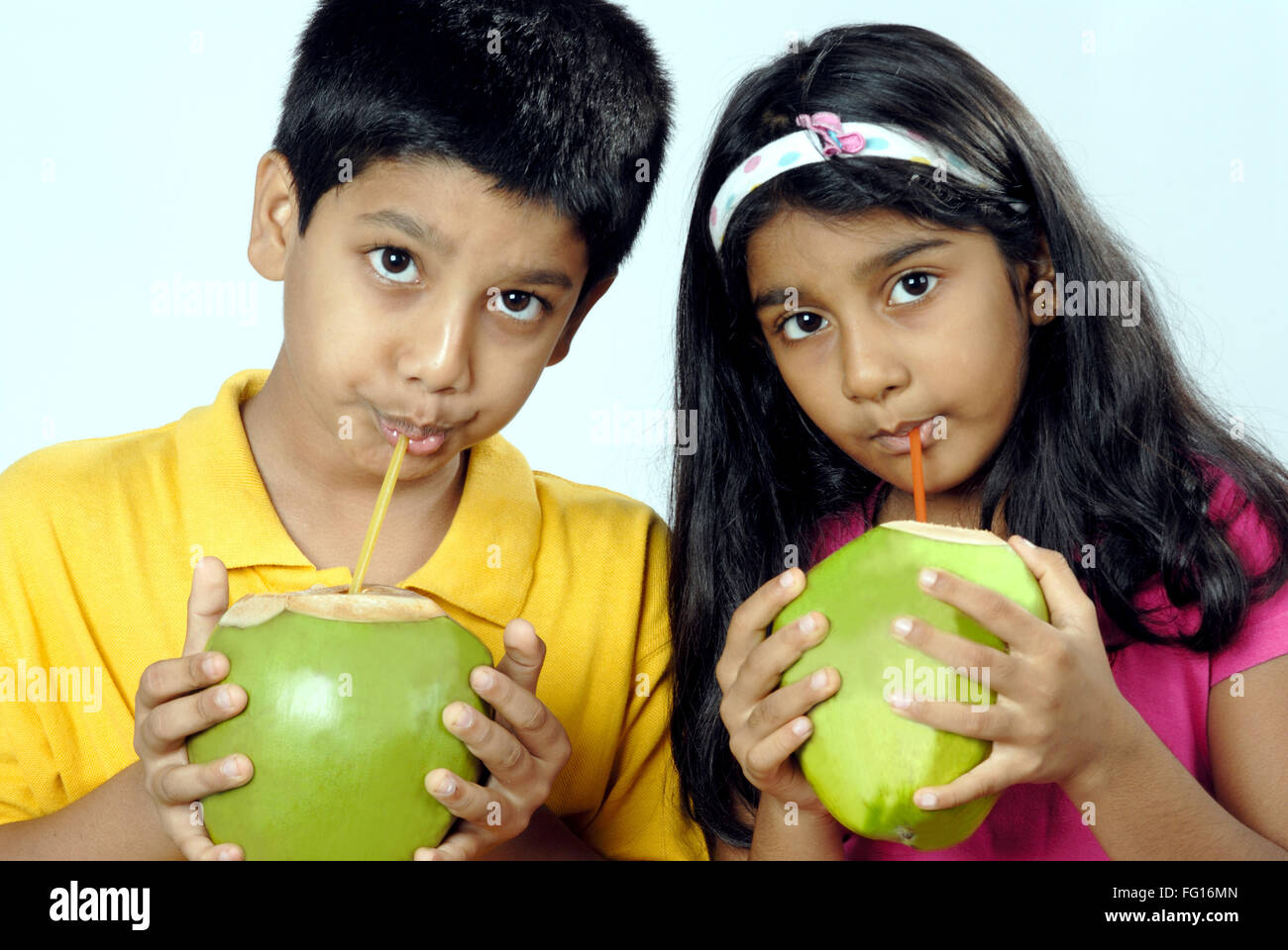 Kids drinking coconut water hires stock photography and images Alamy