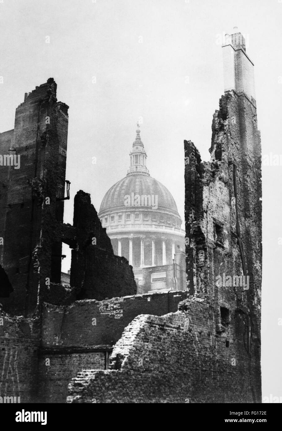 WORLD WAR II: LONDON BLITZ. /nSaint Paul's Cathedral behind ruined buildings following a German air raid during World War II. Photograph, 1941. Stock Photo