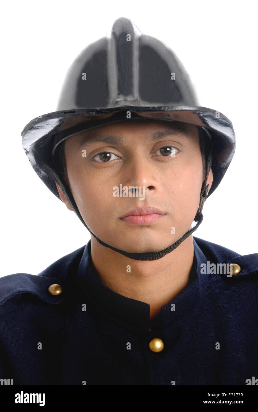 Fireman in uniform seriously looking at camera MR#782W Stock Photo