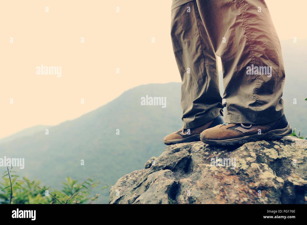 young woman hiker hiking at mountain peak Stock Photo - Alamy