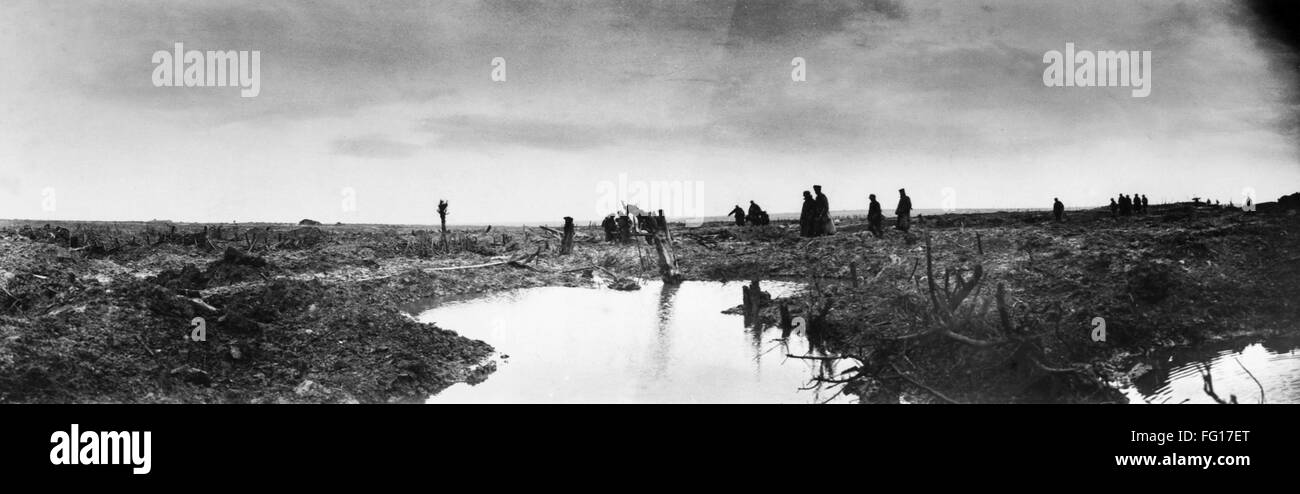 WWI: PASSCHENDAELE, 1917. /nCanadian soldiers and German prisoners crossing a muddy battlefield after the Battle of Passchendaele in Belgium. Photograph by William Rider-Rider, 1917. Stock Photo