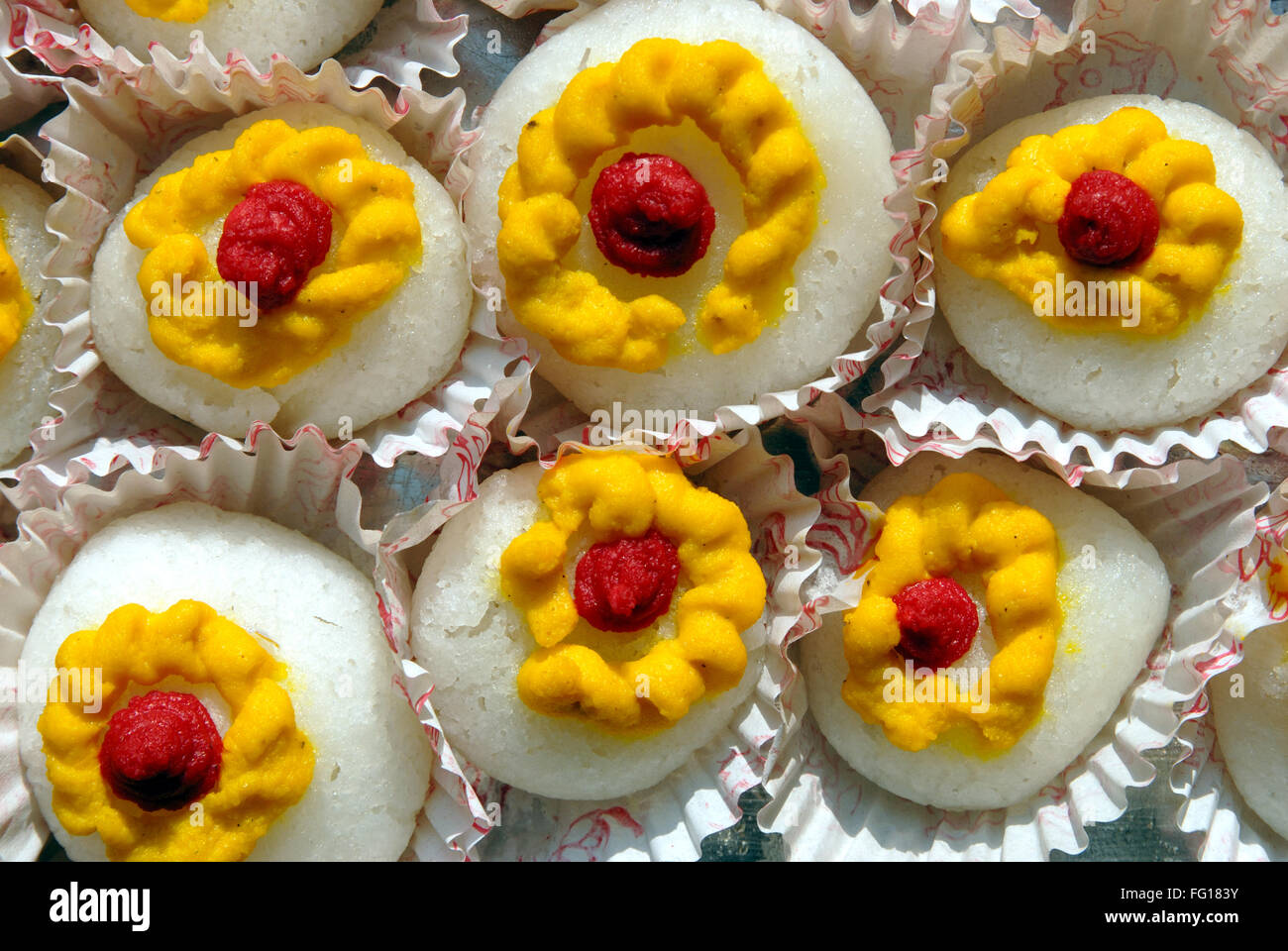 Sweet dish , Bengal sweet rasgulla multi color circle made by mava and malai, Rasgulla