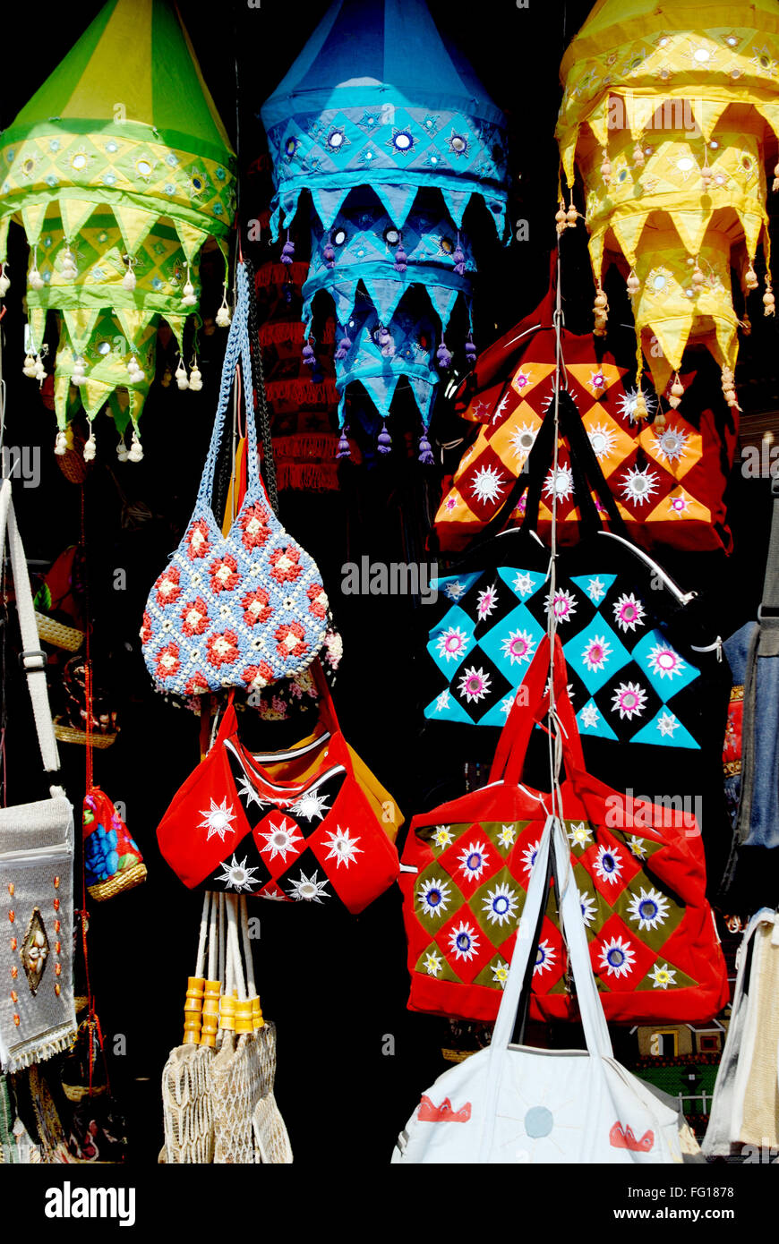 Decorative different types of Colourful lamps bags purse hanging wall piece made of cotton fabric and patch work Stock Photo