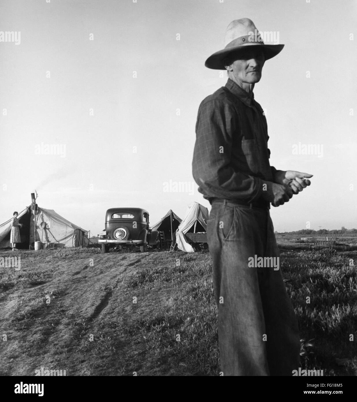 DROUGHT REFUGEES, 1935. /nRefugees from the Oklahoma drought camping by the roadside. Photograph by Dorothea Lange, 1935. Stock Photo