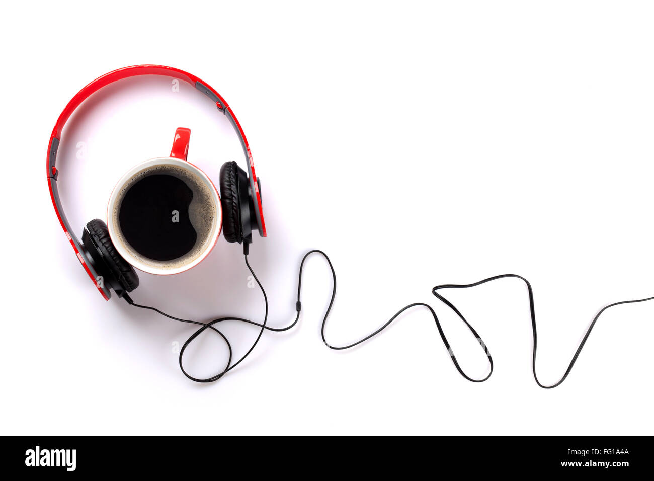 Headphones and coffee cup. Music concept. Isolated on white background