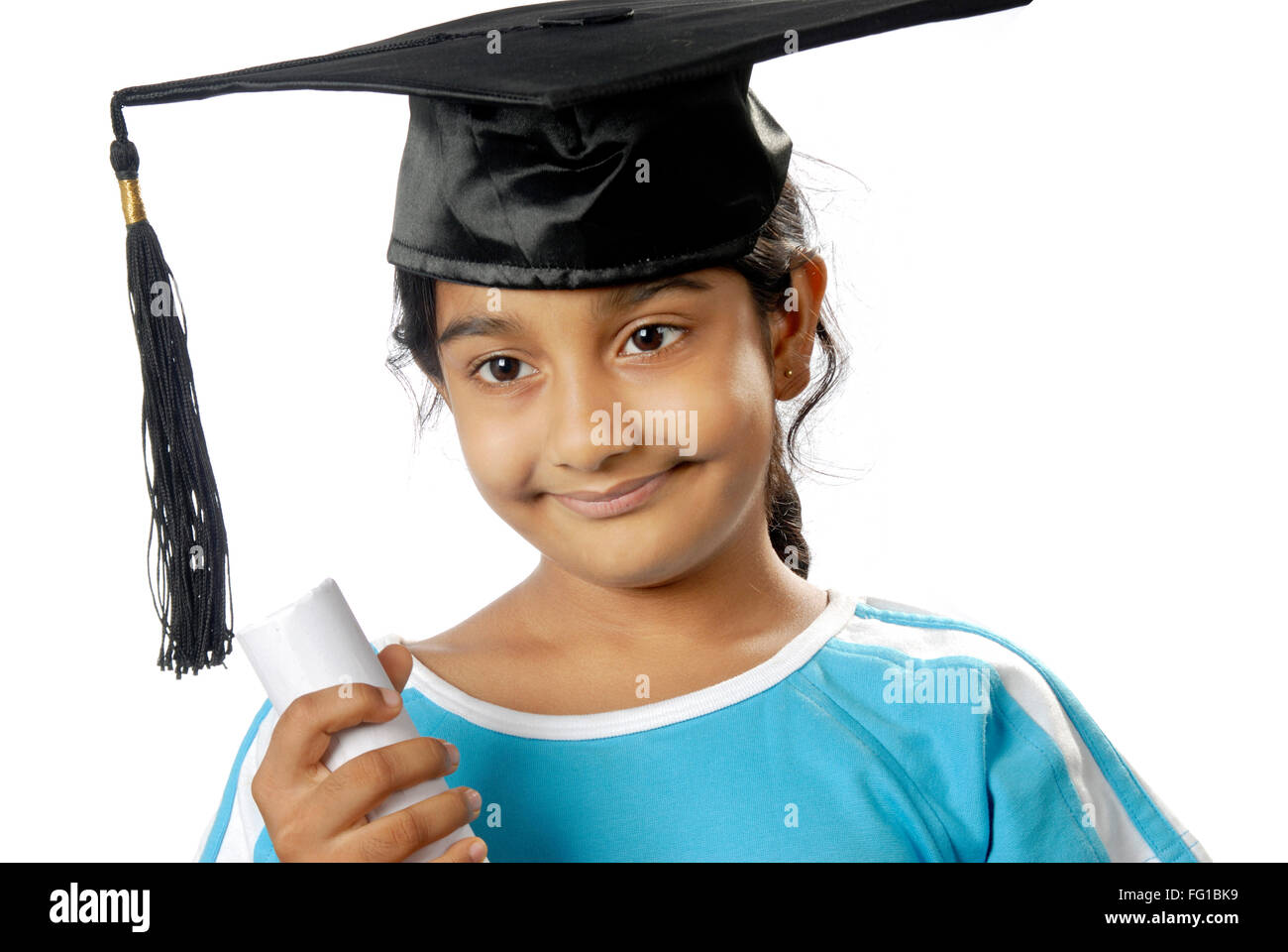 Young Girl Wearing Degree Cap Holding His LLB Degree Looking At Side MR young-girl-wearing-degree-cap-holding-his-llb-degree-looking-at-side-mr