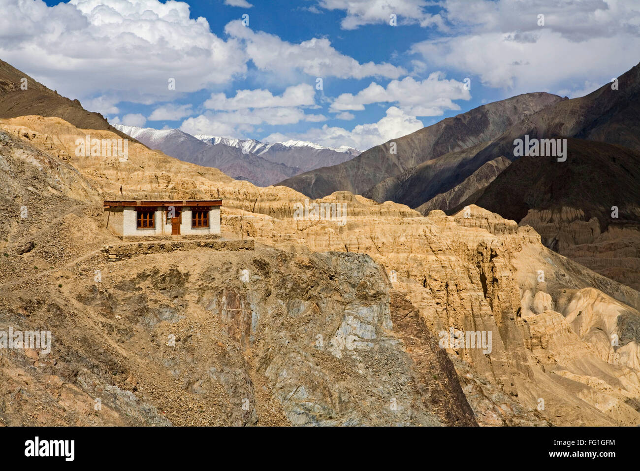 One of meditation cell of Lamayuru Buddhist Monastery rising above mass of eroded cliffs Leh Kargil road Ladakh Jammu Kashmir Stock Photo