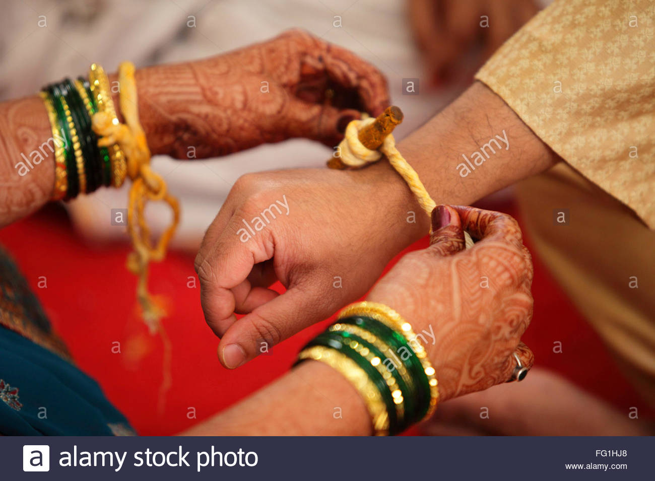 Red thread from Jerusalem on the wrist Red thread from Jerusalem on the wrist