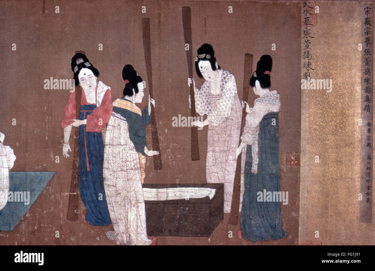 CHINA: SILK MANUFACTURE. /nWomen beating silk fibers in a trough with flails. Detail from 'Court Ladies Preparing Newly-woven Silk,' a painted silk handscroll attributed to Emperor Hui Tsung, Sung Dynasty, early 12th century, after a work by a T'ang Dynas Stock Photo