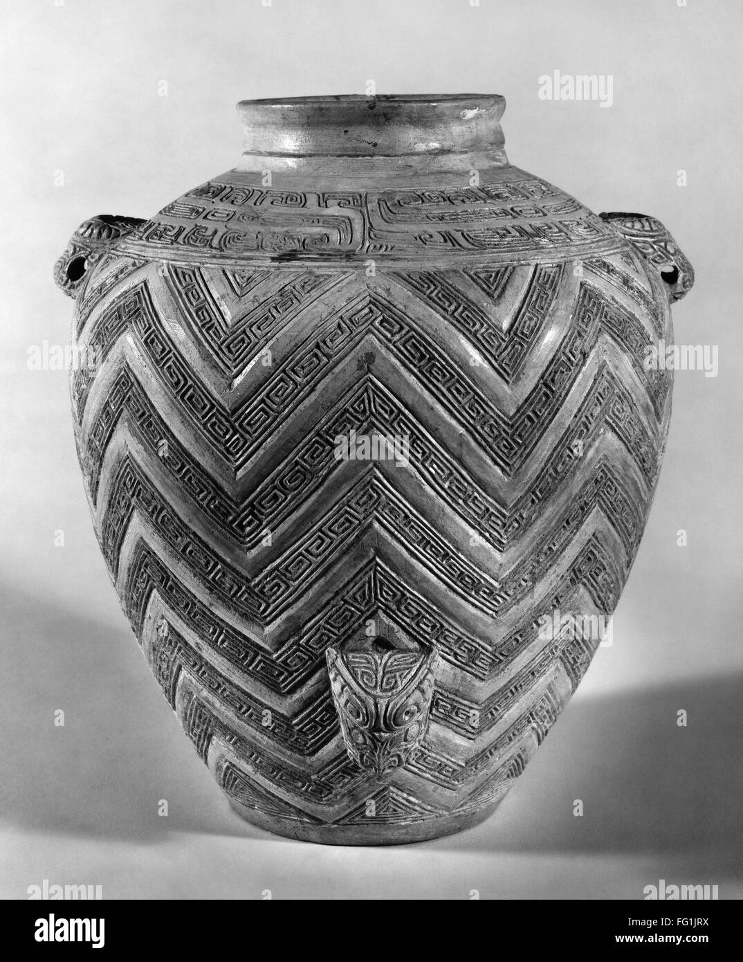 CHINA: POTTERY. /nUnglazed white pottery jar decorated with geometric shapes and dragons, from Anyang, China, made during the Late Shang dynasty, late 13th - early 12th century B.C. Stock Photo