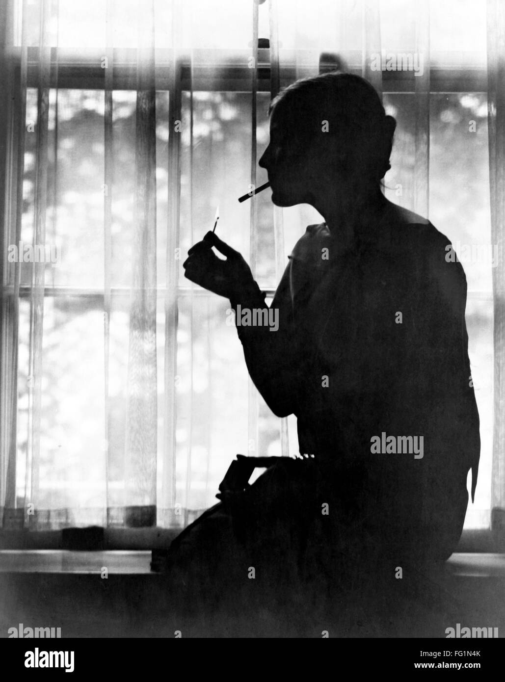 SILHOUETTE, c1925. /nDebutante Miss Ester Cochran in silhouette. Photograph, c1925. Stock Photo