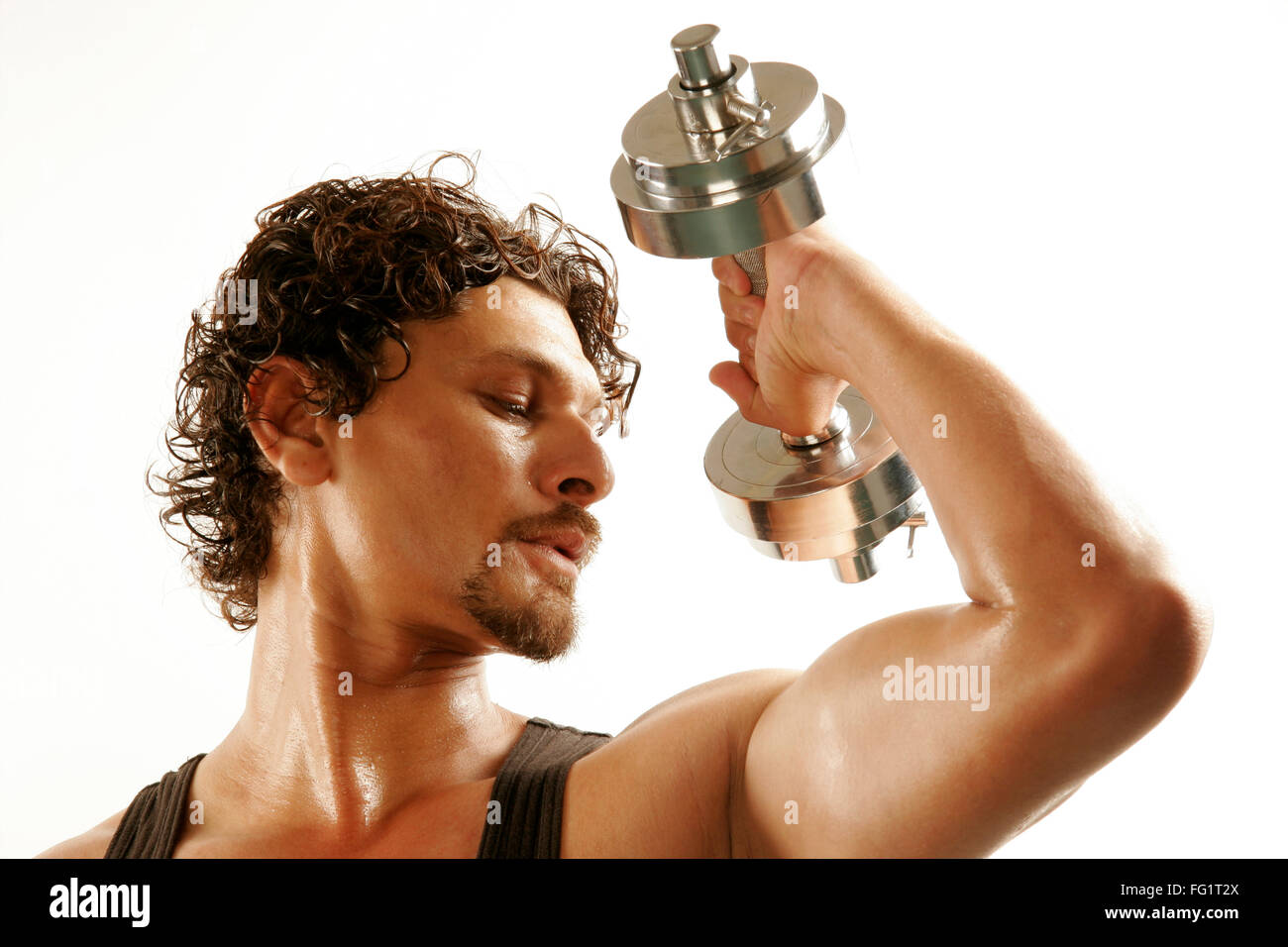 South Asian Indian Man Wearing Black Vest And Curly Oily Hair