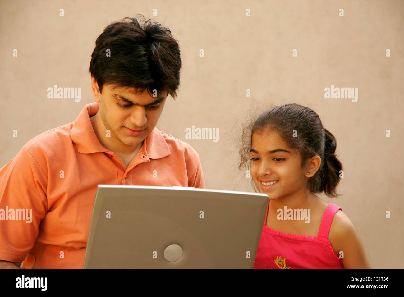 Indian Girl Teaching Brother Hi res Stock Photography And Images Alamy