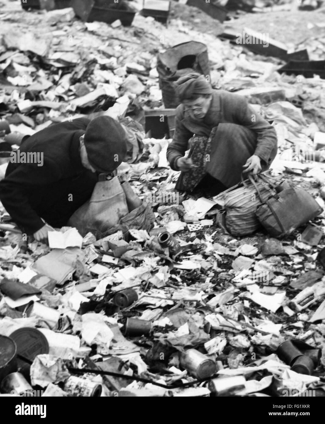 BERLIN, 1945. /nWomen searching for food in a garbage dump in Berlin